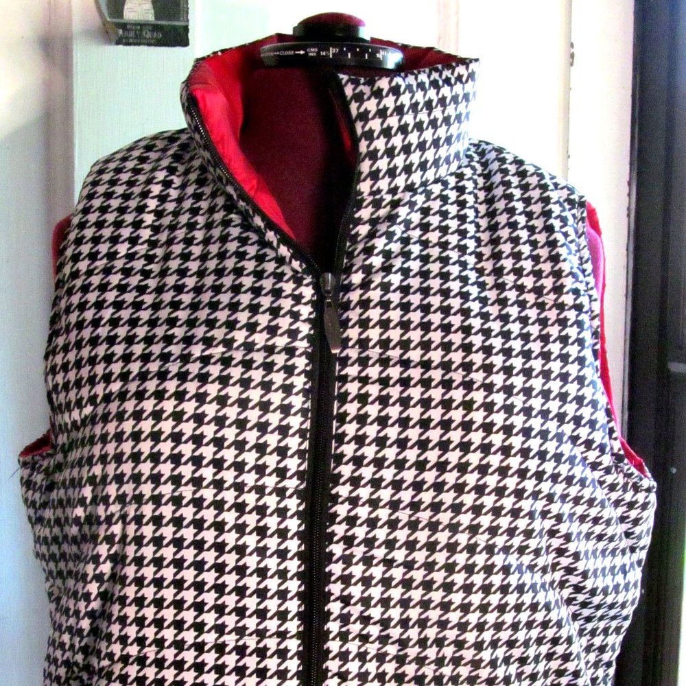 White and Black Houndstooth Patterned Puffy Vest with Red Lining.